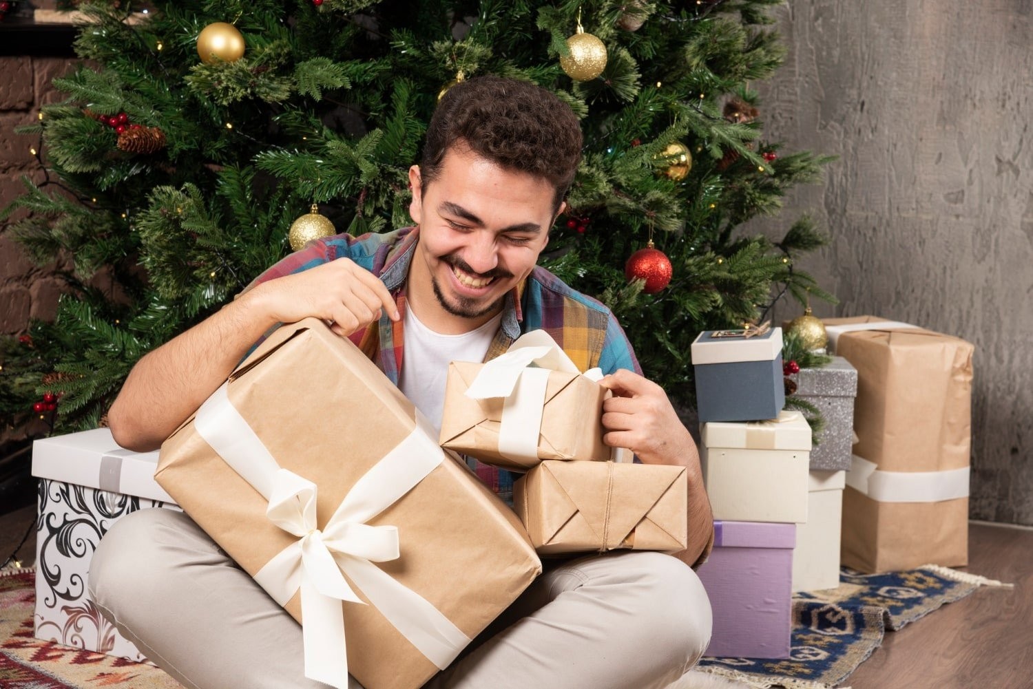 handsome-smiling-man-with-his-presents-min.jpg